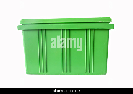 Green Plastic box Packaging of finished goods on white background. Stock Photo