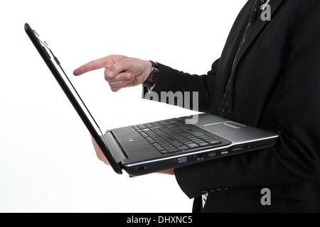 Man pointing at laptop screen Stock Photo