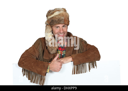 Man in trapper costume Stock Photo