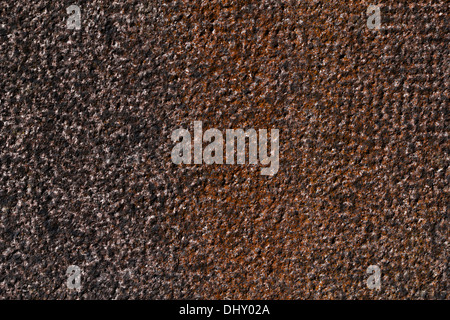 hammered granite background in black and red. Stock Photo