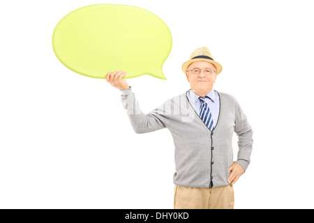 Senior smiling gentleman holding an empty speech bubble and looking at camera Stock Photo