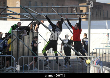 Battersea Park London, UK November 16th 2013. Participants take part in a  10k urban assault course race which features numerous obstacles including mud baths  set around Battersea Park station Credit:  amer ghazzal/Alamy Live News Stock Photo