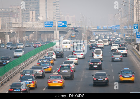 BEIJING, CHINA - MARCH 10, 2023 - Traffic flows along the West Fourth Ring  Road in smog on March 10, 2023 in Beijing, China. Sand and dust weather hit  Stock Photo - Alamy