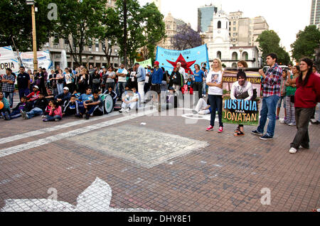 Argentina, Buenos Aires - November 15, 2013: relatives of victims of the so-called 'trigger happy' name given to police violence, manifested in Plaza de Mayo to demand justice for the death of young people killed by police repression. Stock Photo