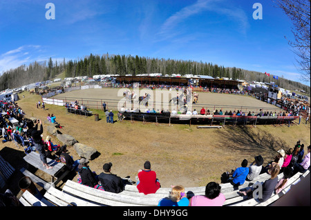 A fish eye view of a rodeo arena with a drill team performing a ride Stock Photo