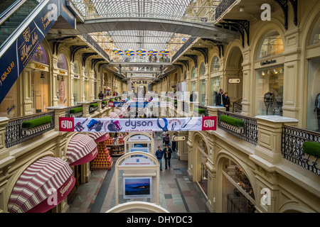 MOSCOW - CIRCA MARCH 2013: Interior view of the GUM Shopping Mall in the Red Square in Moscow, circa 2013. With a population of more than 11 million people is one the largest cities in the world and a popular tourist destination. Stock Photo