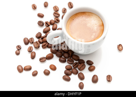 Small espresso cup with coffee beans isolated on white Stock Photo