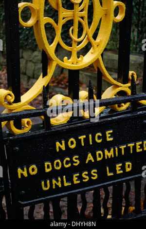 Old Victorian park sign - notice no dogs addmitted unless led - on lead Stock Photo