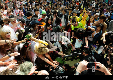 Crowd of Zombies attacking zombie-killers in the inaugural Zombie Walk, Perth, Western Australia Stock Photo