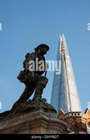 The Shard London's tallest building photographed from the war memorial soldier statue in Borough High Street UK Stock Photo