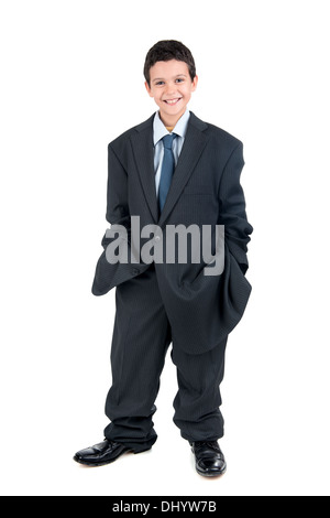 Young boy dressed with a big man's suit Stock Photo