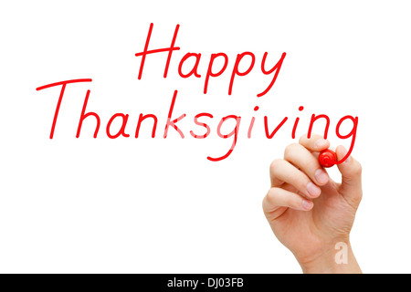 Hand writing Happy Thanksgiving with red marker on transparent wipe board. Stock Photo