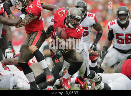 Tampa, Florida, USA. 17th Nov, 2019. Tampa Bay Buccaneers linebacker Devin  White (45) tackles New Orleans Saints wide receiver Michael Thomas (13)  during the NFL game between the New Orleans Saints and