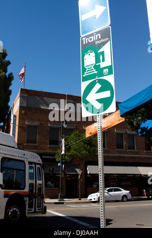 A road sign in Old Towne Orange California giving direction to the railway station Stock Photo