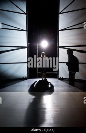 Hamburg, Germany. 13th Nov, 2013. The actors Bettina Stucky (L) and Matthias Bundschuh perform onstage during a photo rehearsal of the play 'Nach Europa' ('To Europe') at the Schauspielhaus in Hamburg, Germany, 13 November 2013. The theatre play 'To Europe', which is based on the novel 'Three Strong Women' by Marie NDiaye, premiered on 17 November 2013 under die direction of Friederike Heller. Photo: Christian Charisius/dpa/Alamy Live News Stock Photo