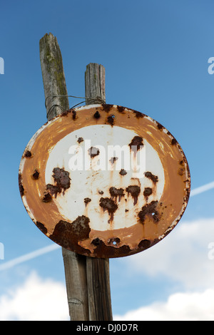 Rusty Old No Vehicles Traffic Sign Against The Blue Sky Stock Photo