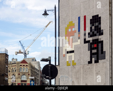 Star Wars themed street art using mosaic tiles by the artist Invader in London Stock Photo