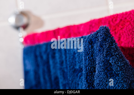 Two towels drying up on the wall rack Stock Photo
