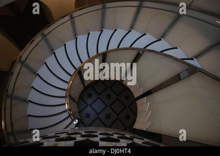 London, UK. 18th November 2013. The striking new spiral staircase sweeping down from the main entrance area to the new pubic spaces below unveiled at Tate Britain on November 18, 2013 in London, England. Credit:  Zenon Stefaniak/Alamy Live News