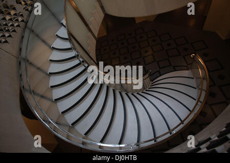 London, UK. 18th November 2013. The striking new spiral staircase sweeping down from the main entrance area to the new pubic spaces below unveiled at Tate Britain on November 18, 2013 in London, England. Credit:  Zenon Stefaniak/Alamy Live News Stock Photo