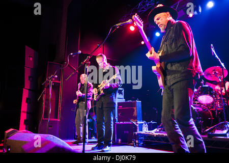 Manchester, UK. 17th November 2013. US rock band Television in concert at Manchester Academy. Fred Smith (bass), Tom Verlaine and Jimmy Rip, guitars