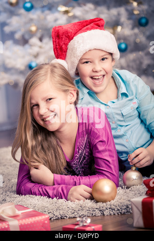 teenage sister getting Christmas gifts Stock Photo - Alamy