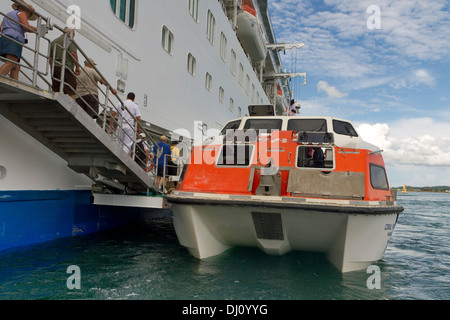 Passengers disembarking by tender from Coral Princess cruise ship on Gatun Lake Panama Stock Photo