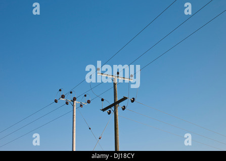Intersection of telegraph poles and wires. Stock Photo