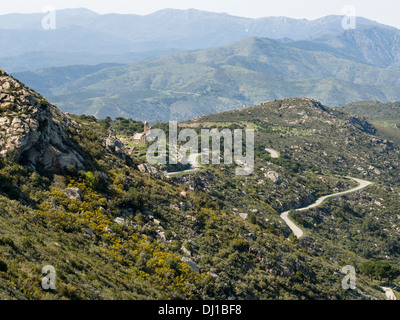 Chapel in the Hills. A long and winding road leads up to the small Saint Helena Church high in the mountains. Stock Photo