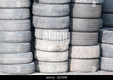 background with old tires on each other Stock Photo