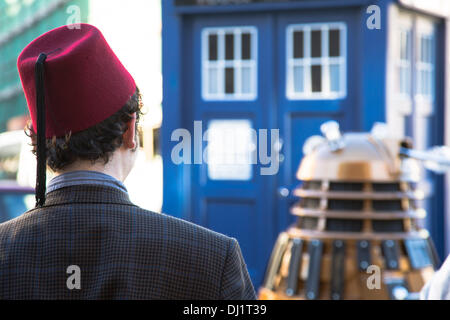 Aberystwyth, Wales, UK, 19 November 2013. A Dalek, K9 and the Tardis from the popular Dr Who BBC TV series materialise in Aberystwyth, much to the delight of onlookers. Credit:  atgof.co/Alamy Live News Stock Photo