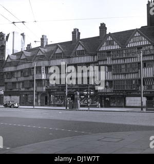 Historical picture from 1950s of a row of Elizabethan era buildings. Stock Photo