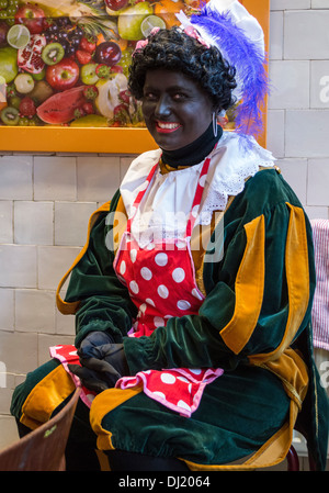 dutch zwarte piet, traditional costume and black face for the sinterklaas party Stock Photo