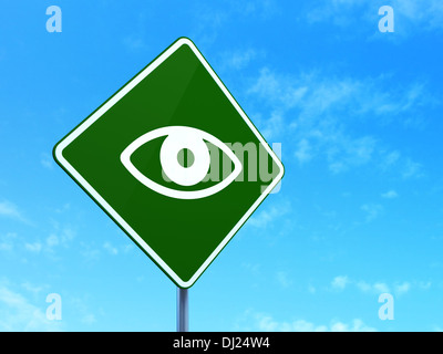 Security concept: Eye on road sign background Stock Photo - Alamy