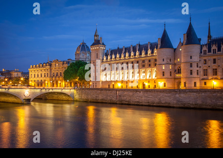 The Conciergerie along River Seine, Paris France Stock Photo