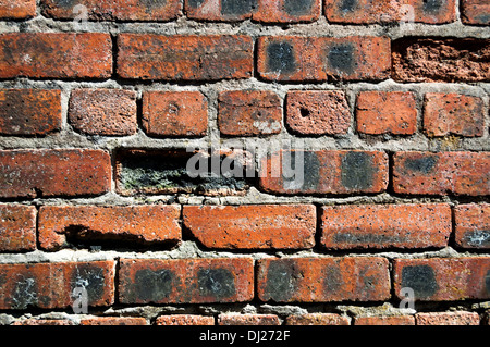 Old aged worn out brick wall Stock Photo