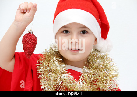 little child face with santa hat Stock Photo