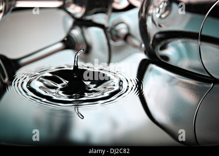 Closeup Pictures water drops a beautiful shape in Basin. Stock Photo