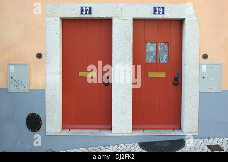 Two old doors Alfama old district Lisbon Lisboa Portugal Stock Photo
