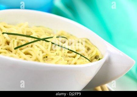 Vegetarian Asian noodle soup garnished with chives (Selective Focus) Stock Photo