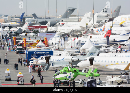 Many aircraft on apron at Al Maktoum International airport during Dubai Airshow 2013 in United Arab Emirates Stock Photo