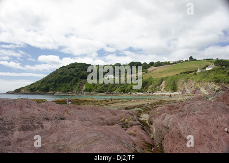 Talland Bay is a small and quiet place midway between Looe and Polperro. There are lots of rock pools to discover at low tide. Stock Photo