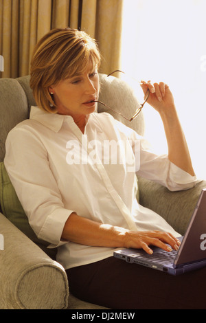 Businesswoman Using Laptop Stock Photo