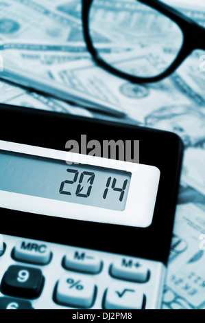 number 2014, as the new year, on the display of a calculator Stock Photo
