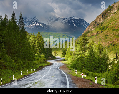 Summer landscape with road and cloudy sky Stock Photo - Alamy