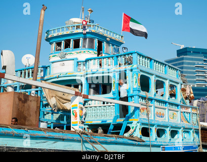 Traditional cargo dhow at cargo wharf on The Creek in Dubai United Arab Emirates Stock Photo