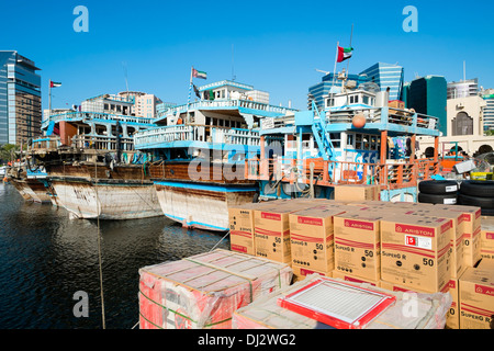 Traditional cargo dhows at cargo wharf on The Creek in Dubai United Arab Emirates Stock Photo
