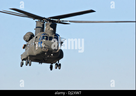 A US Army CH-47F Chinook helicopter takes off on a mission November 12, 2013 at Forward Operating Base Fenty in Nangarhar province, Afghanistan. Stock Photo