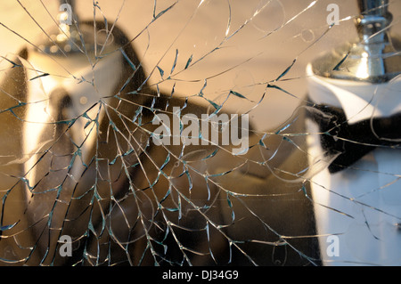 London, England, UK. Broken shop window - safety glass Stock Photo