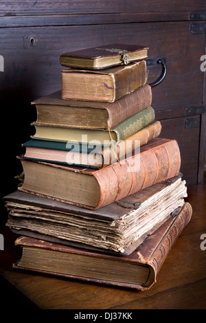 Pile of antique books, one of them over 300 years old Stock Photo